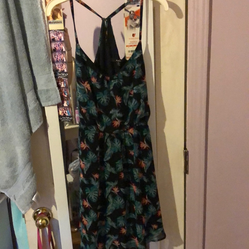 Short black dress with flower/leaf design